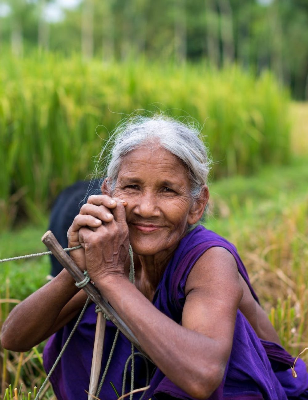 Smiling Woman at the Field